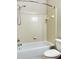 Bathroom with a shower/tub combo and white tile at 331 Providence Glen Dr, Chapel Hill, NC 27514