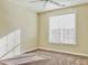 Bright bedroom with carpeted floor and large window at 331 Providence Glen Dr, Chapel Hill, NC 27514