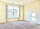 Spacious bedroom with large window and neutral decor at 331 Providence Glen Dr, Chapel Hill, NC 27514