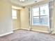 Well-lit bedroom featuring neutral walls and carpet flooring at 331 Providence Glen Dr, Chapel Hill, NC 27514