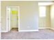 Bright bedroom with neutral walls, carpet, and a walk-in closet at 331 Providence Glen Dr, Chapel Hill, NC 27514