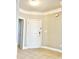 Bright entryway with tiled floor and neutral color palette at 331 Providence Glen Dr, Chapel Hill, NC 27514