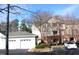 Exterior view of building, two-car garage, and parking at 331 Providence Glen Dr, Chapel Hill, NC 27514