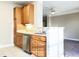 Kitchen features a breakfast bar and stainless steel dishwasher at 331 Providence Glen Dr, Chapel Hill, NC 27514