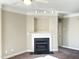 Living room with fireplace and neutral carpeting at 331 Providence Glen Dr, Chapel Hill, NC 27514