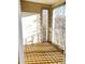 Sunroom with wooden deck and access to outdoors at 331 Providence Glen Dr, Chapel Hill, NC 27514