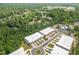 Aerial view of townhome community near wooded area and amenities at 4015 Southpoint Lndg Way, Durham, NC 27707