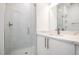 Modern bathroom with white vanity, quartz countertop, and glass shower at 4015 Southpoint Lndg Way, Durham, NC 27707