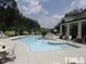 Inviting community pool with surrounding lounge chairs at 4015 Southpoint Lndg Way, Durham, NC 27707