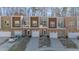Modern townhome community with attached garages and balconies at 4015 Southpoint Lndg Way, Durham, NC 27707