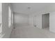 Spacious bedroom with carpeting and door to hallway at 6126 Kayton St, Raleigh, NC 27616