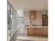 Bright modern kitchen featuring a large island, sleek cabinetry, and expansive windows offering natural light at 6358 Pathway Ct Ct, Chapel Hill, NC 27516
