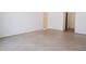 Bright living room featuring modern concrete flooring and base trim at 6358 Pathway Ct Ct, Chapel Hill, NC 27516