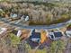 Aerial view of homes and a cul-de-sac in a quiet neighborhood at 678 The Parks Dr, Pittsboro, NC 27312