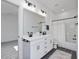 Shared bathroom with double vanity and tub shower combo at 678 The Parks Dr, Pittsboro, NC 27312