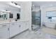 Modern bathroom with double vanity, walk-in shower, and stylish finishes at 678 The Parks Dr, Pittsboro, NC 27312