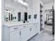 Modern bathroom with double vanity, walk-in shower, and stylish finishes at 678 The Parks Dr, Pittsboro, NC 27312