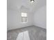 Bright and airy bedroom with grey carpet and large window at 678 The Parks Dr, Pittsboro, NC 27312