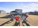 Firepit and seating area overlooking backyard at 70 Kinsale Ct, Fuquay Varina, NC 27526