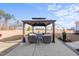Covered patio with seating area in backyard at 70 Kinsale Ct, Fuquay Varina, NC 27526