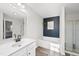 Clean bathroom with a large soaking tub and vanity at 70 Kinsale Ct, Fuquay Varina, NC 27526