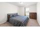 Bedroom with a king-size bed and dresser at 70 Kinsale Ct, Fuquay Varina, NC 27526