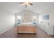 Cozy bedroom with a queen-size bed and ceiling fan at 70 Kinsale Ct, Fuquay Varina, NC 27526