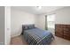 Cozy bedroom with a double bed, dresser, and window at 70 Kinsale Ct, Fuquay Varina, NC 27526