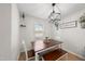 Bright dining area with a table, bench, and four chairs at 70 Kinsale Ct, Fuquay Varina, NC 27526