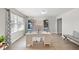 Home office with hardwood floors, built-in shelving, and a workspace at 70 Kinsale Ct, Fuquay Varina, NC 27526