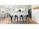 Open concept kitchen with breakfast bar and modern finishes at 70 Kinsale Ct, Fuquay Varina, NC 27526