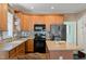 Well-equipped kitchen with an island and stylish backsplash at 7302 Caversham Way, Raleigh, NC 27617