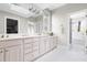 Bathroom featuring a double vanity, walk-in closet, and a separate shower at 76527 Rice, Chapel Hill, NC 27517