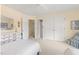 Comfortable bedroom with plush carpeting, white trim, and double closets, providing a relaxing space at 76527 Rice, Chapel Hill, NC 27517