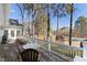 Deck overlooking a wooded area and golf course at 76527 Rice, Chapel Hill, NC 27517