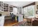 Bright home office boasts custom built-ins, a large window, and a functional layout at 76527 Rice, Chapel Hill, NC 27517