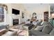 Cozy living room with a fireplace, built-in shelving, and comfortable seating at 76527 Rice, Chapel Hill, NC 27517