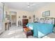 Spacious bedroom with neutral carpet, ceiling fan, and multiple windows at 76527 Rice, Chapel Hill, NC 27517