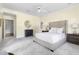 Comfortable main bedroom with tufted headboard, soft carpet, and lots of natural light at 76527 Rice, Chapel Hill, NC 27517