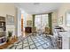 Home office with built-in bookshelves, hardwood floors and ample natural light at 76527 Rice, Chapel Hill, NC 27517