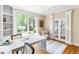 Home office featuring a large window and bright natural light, with built-in shelving at 76527 Rice, Chapel Hill, NC 27517