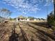 Spacious backyard with a view of neighboring houses at 78 Falls Of The Cape Dr, Lillington, NC 27546