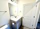 Clean bathroom with vanity, toilet and shower at 78 Falls Of The Cape Dr, Lillington, NC 27546