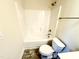 Bathroom featuring a bathtub and shower at 78 Falls Of The Cape Dr, Lillington, NC 27546