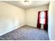 Bright bedroom with neutral walls and carpet at 78 Falls Of The Cape Dr, Lillington, NC 27546