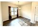 Simple dining room with hardwood floors and a window at 78 Falls Of The Cape Dr, Lillington, NC 27546