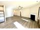 Spacious living area with hardwood floors and fireplace at 78 Falls Of The Cape Dr, Lillington, NC 27546