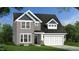 Two-story house with gray siding, white trim, and a two-car garage at 802 Brookfield Dr, Gibsonville, NC 27249