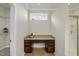Bathroom with granite vanity and a shower at 821 Blackfriars Loop, Cary, NC 27519