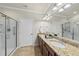 Bathroom with double vanity, granite countertop and shower at 821 Blackfriars Loop, Cary, NC 27519